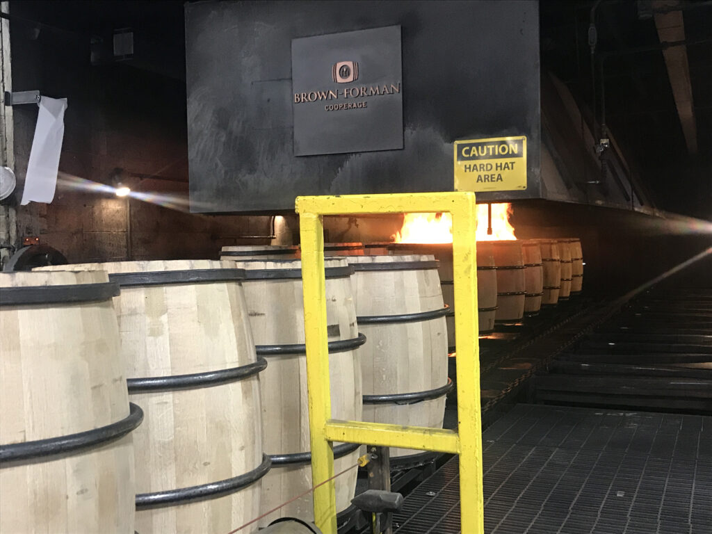 bourbon barrels being charred